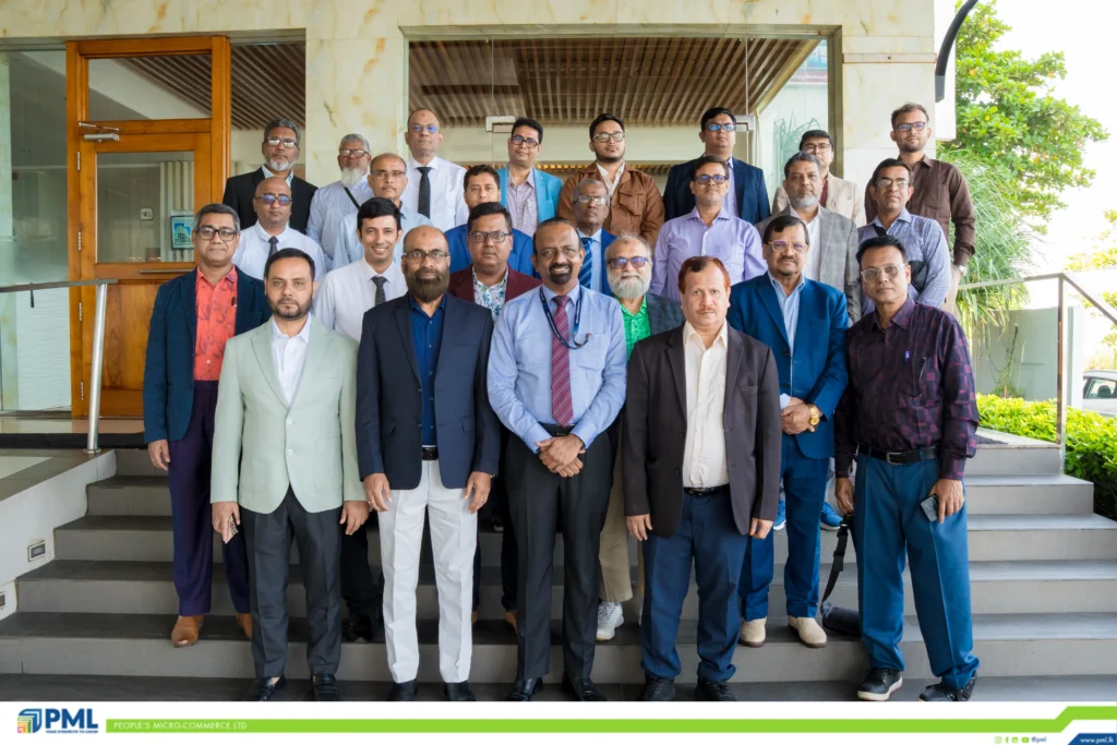 Delegates group photo at PML's regional financial inclusion partnership event
