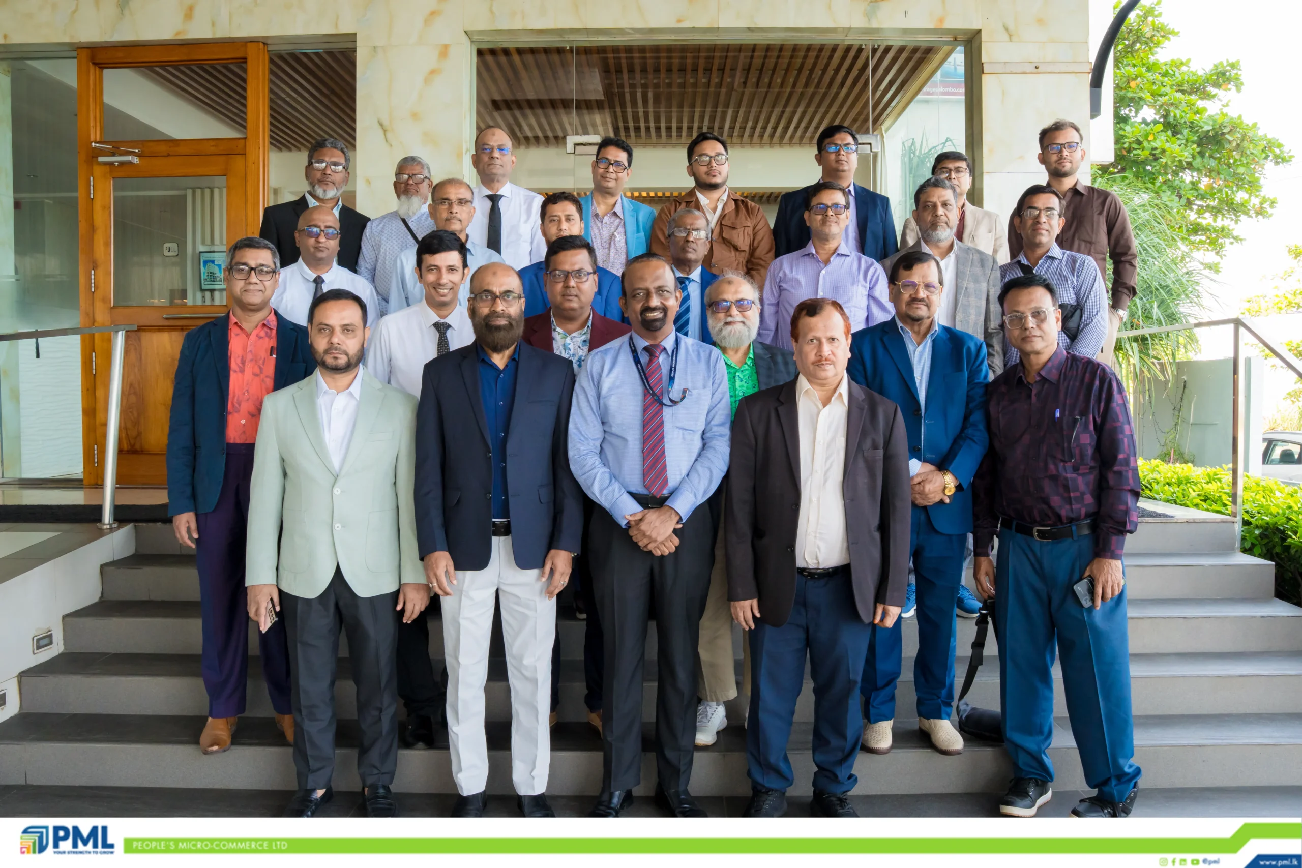 Delegates group photo at PML's regional financial inclusion partnership event