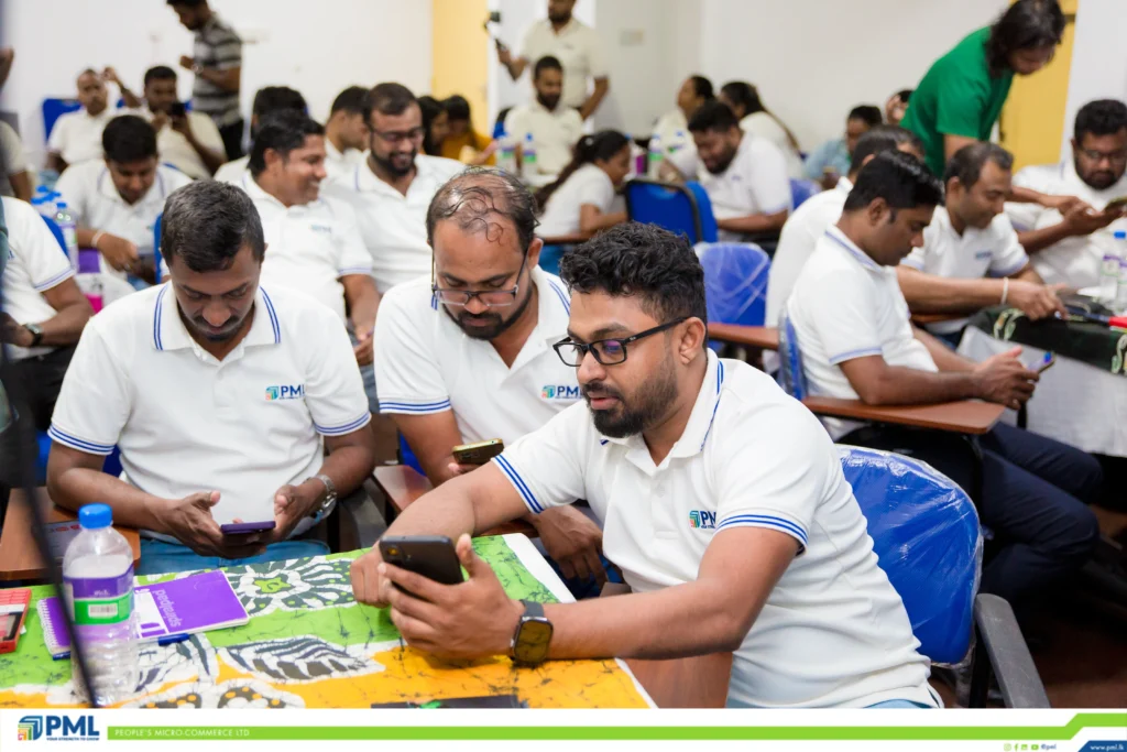 PML staff members using mobile phones during a training activity